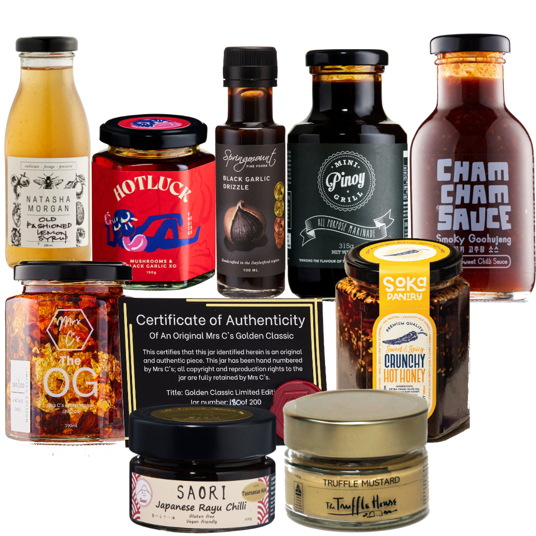 Asian BBQ Gift Box with gourmet sauces and condiments including honey, chili, and mustard for a flavorful experience.