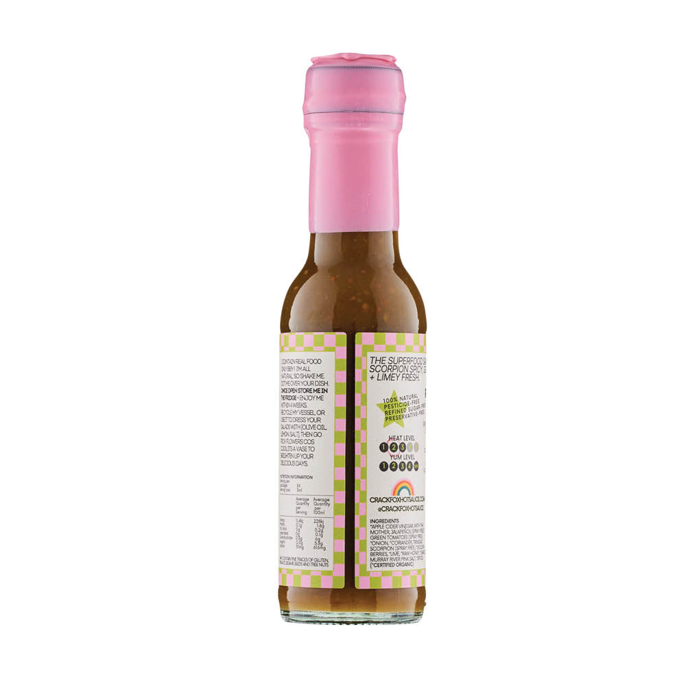 Crack Fox Hot Sauce bottle with pink cap, showcasing all-natural ingredients and nutrition facts.