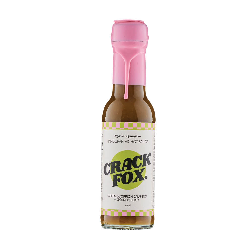 Bottle of Crack Fox handcrafted hot sauce with a pink cap, featuring green scorpion and jalapeño flavors.