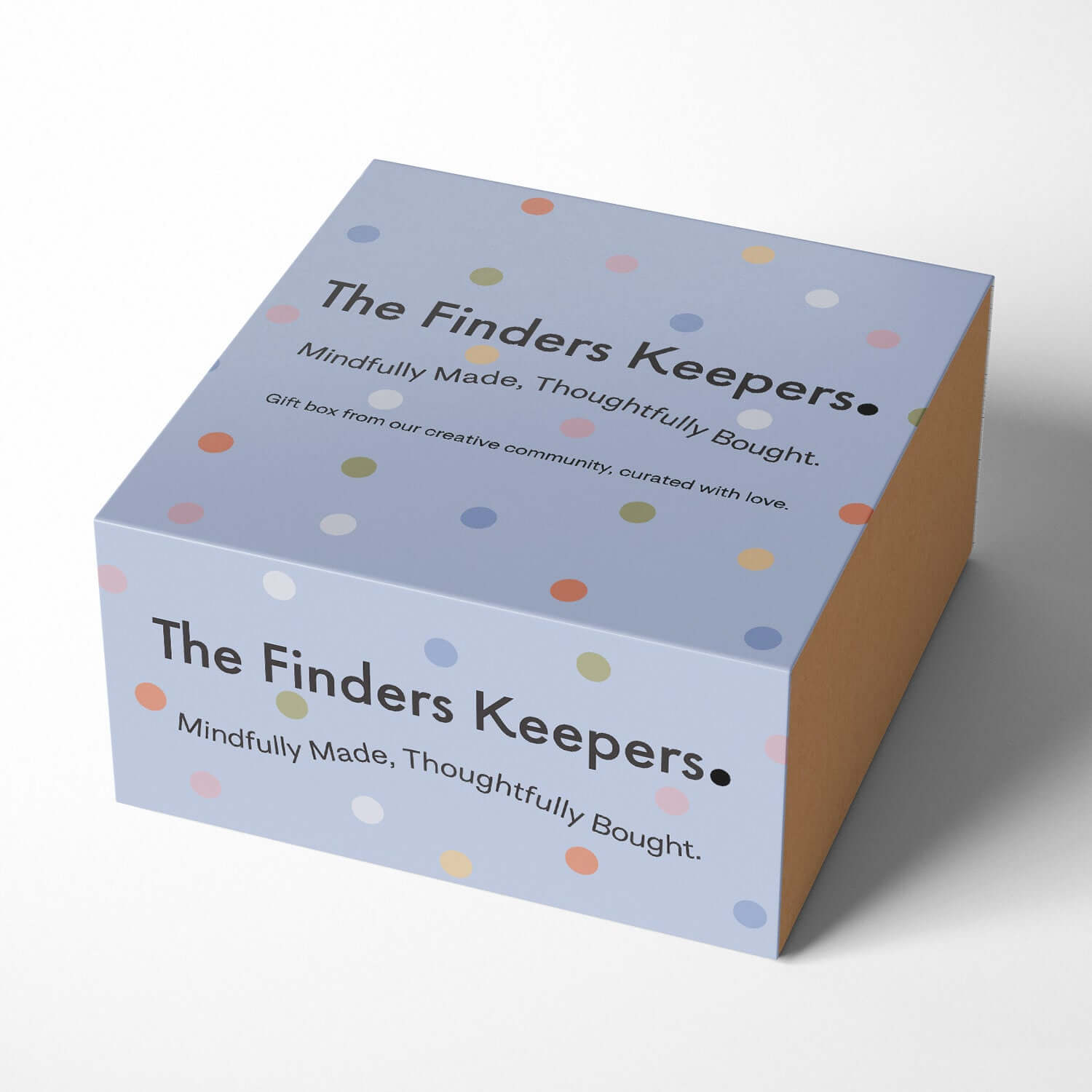 The Finders Keepers gift box with colorful polka dots, labelled as Mindfully Made, Thoughtfully Bought.