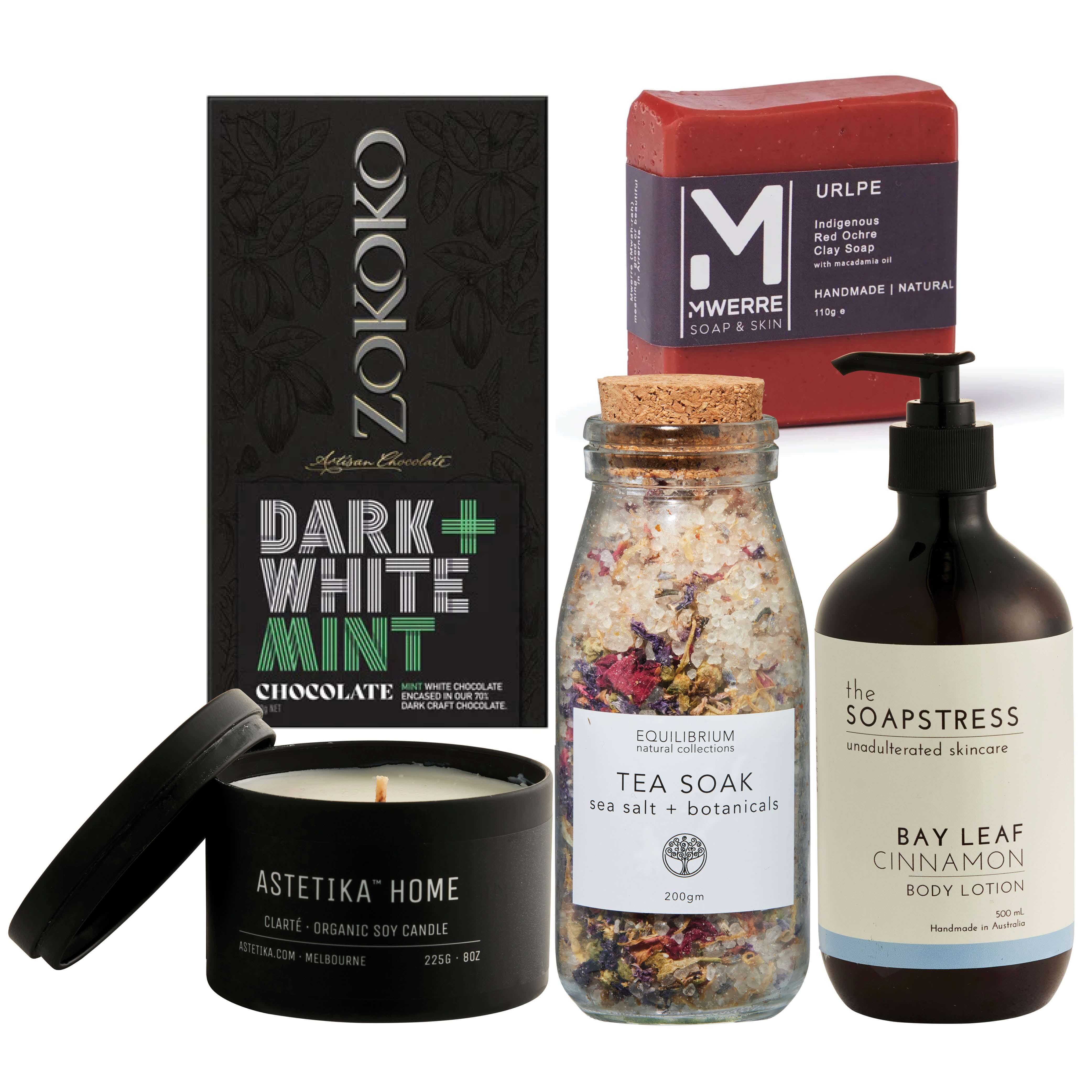 Relax Hamper featuring Dark & White Mint Chocolate, tea soak, candle, and body lotion for a perfect holiday gift.
