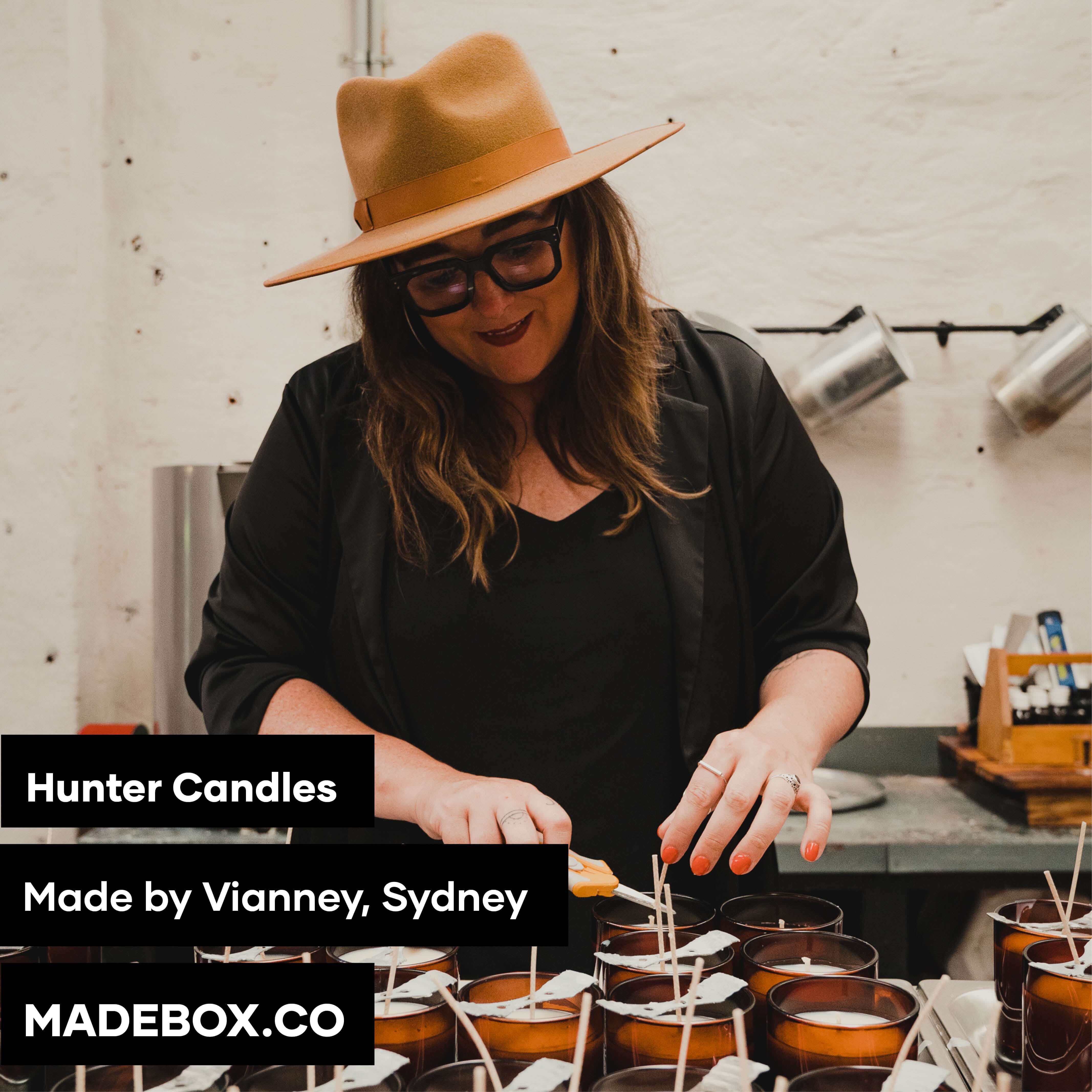 Artisan candle maker Vianney creating Hunter Candles in Sydney, showcasing craftsmanship and attention to detail.