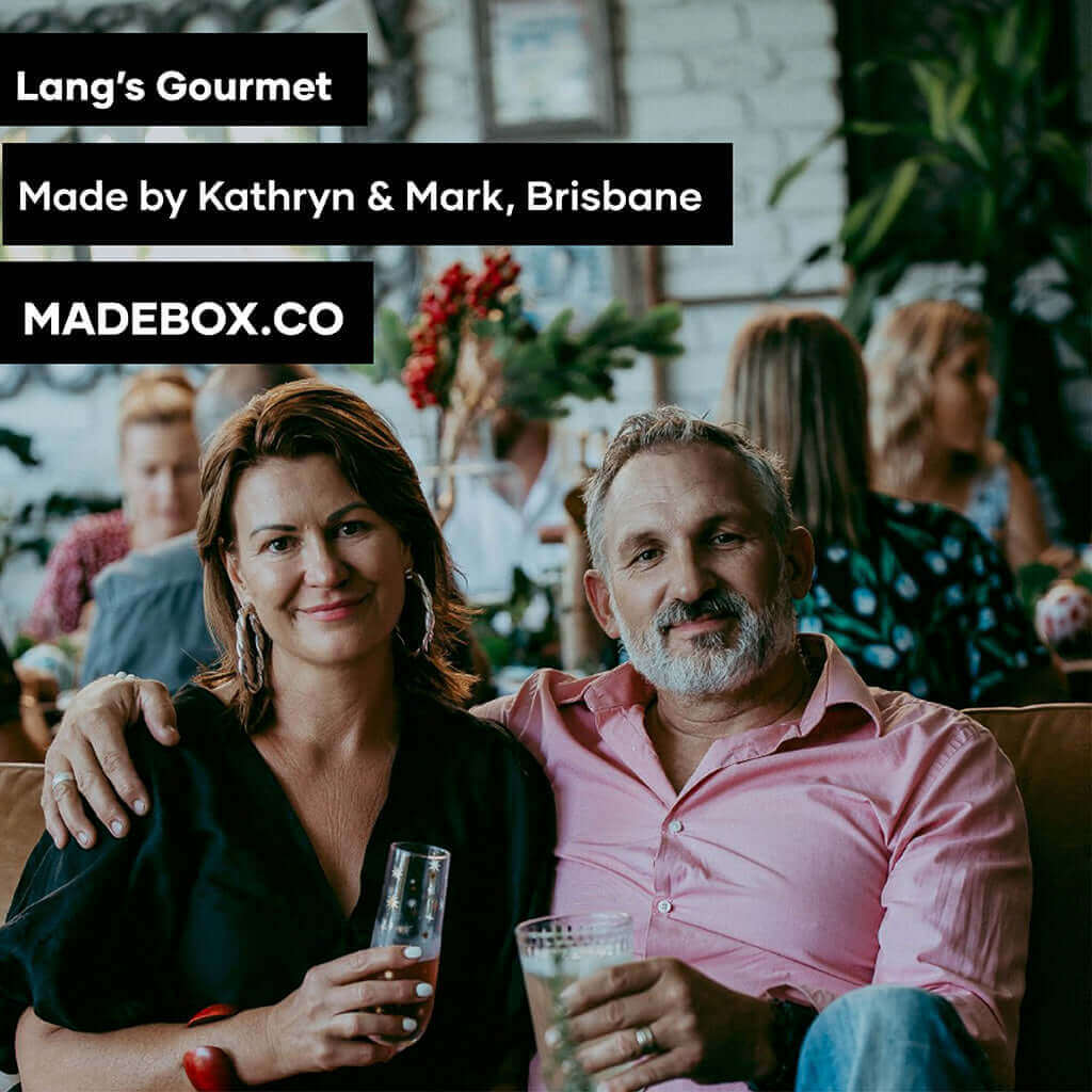 Lang's Gourmet creators Kathryn and Mark enjoying a gathering in Brisbane, showcasing their culinary passion.