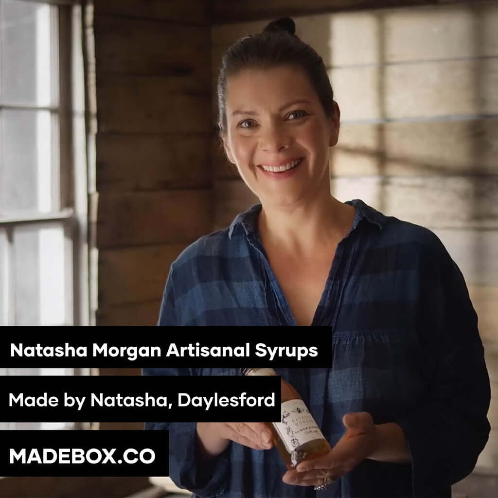 Natasha Morgan holding artisanal syrups in Daylesford, showcasing handmade products from Australia.