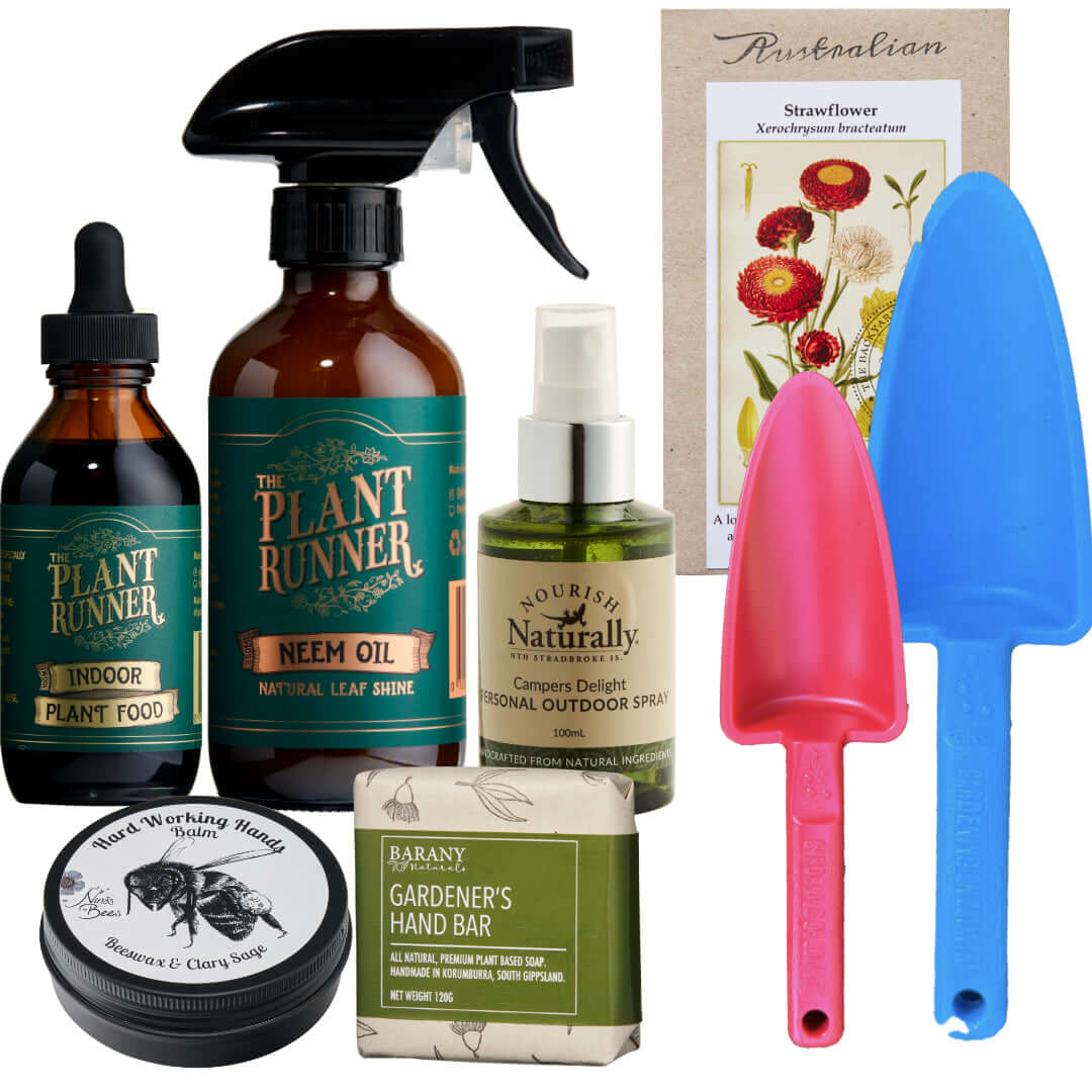 Garden Box contents: plant food, neem oil, gardener's hand bar, and gardening tools for green thumbs.