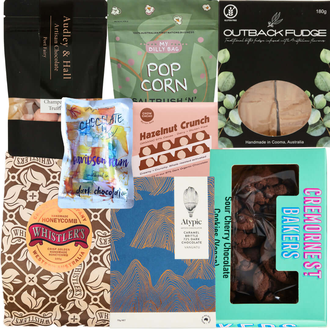 Variety of Australian treats including fudge, popcorn, chocolate, and honeycomb in a festive gift box