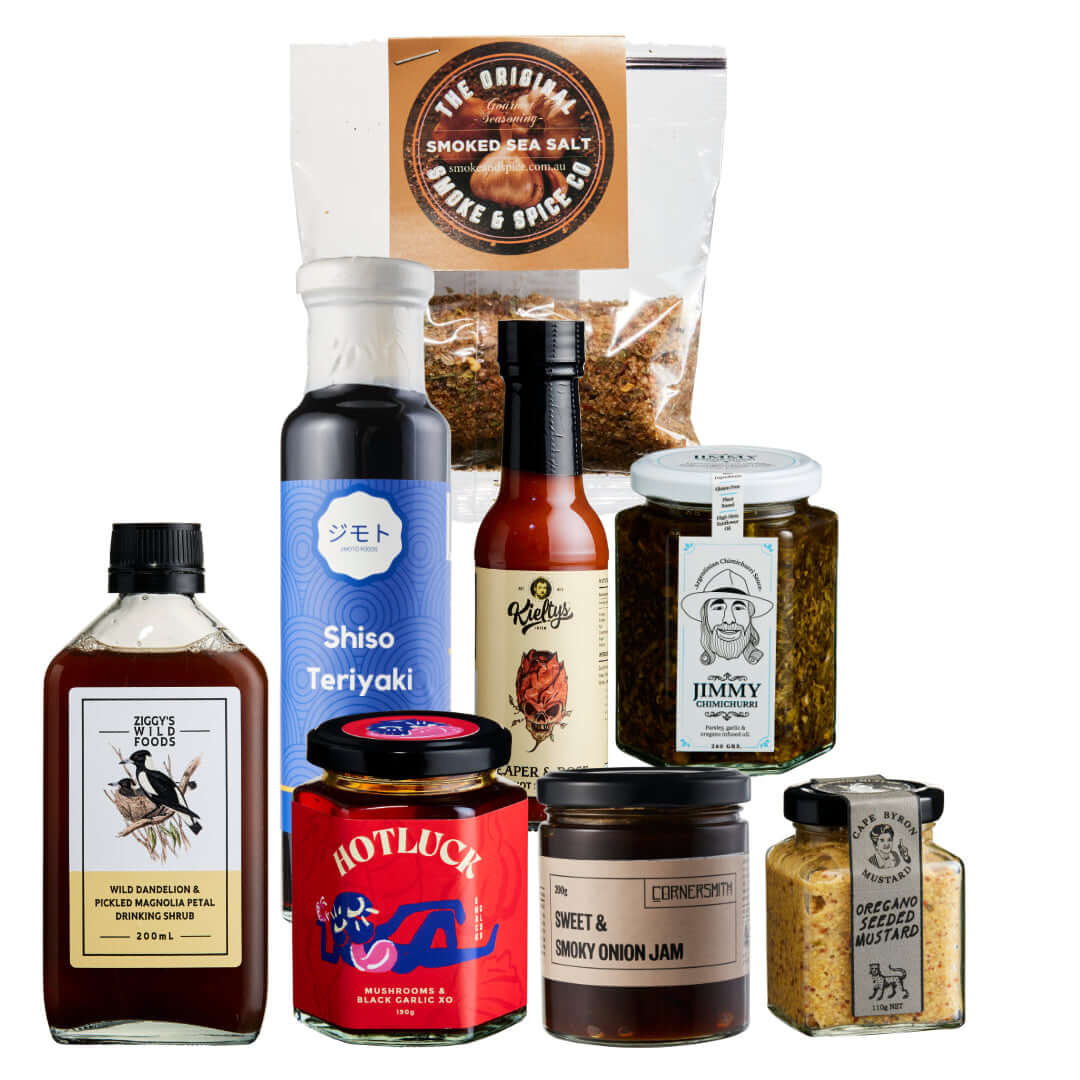 Smoke & Spice Box with a variety of small-batch sauces and seasonings for flavorful meals, perfect for holiday gifting.
