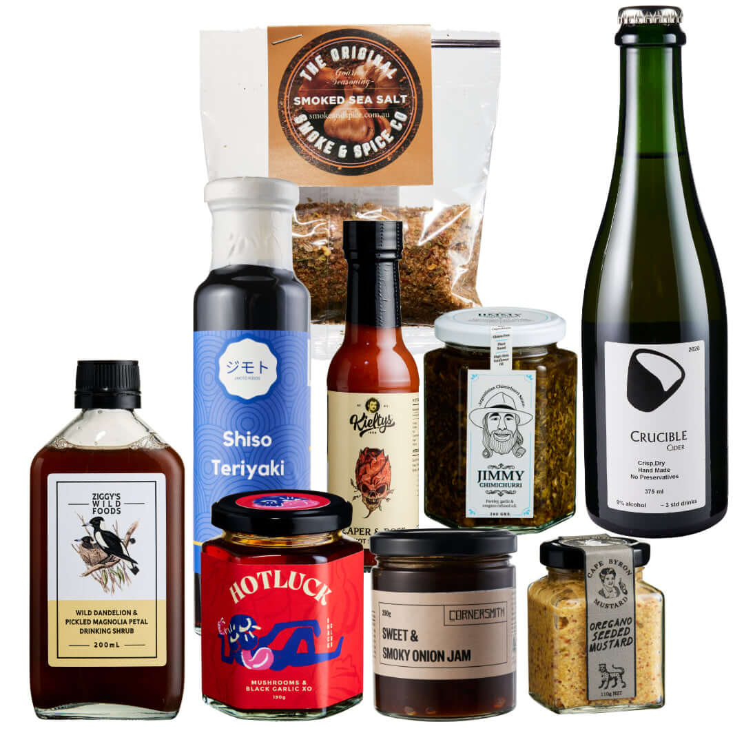 Smoke & Spice Box featuring gourmet sauces, seasonings, and spreads for elevating meals this holiday season.